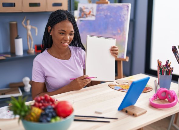 african-american-woman-artist-having-online-draw-class-art-studio (1)