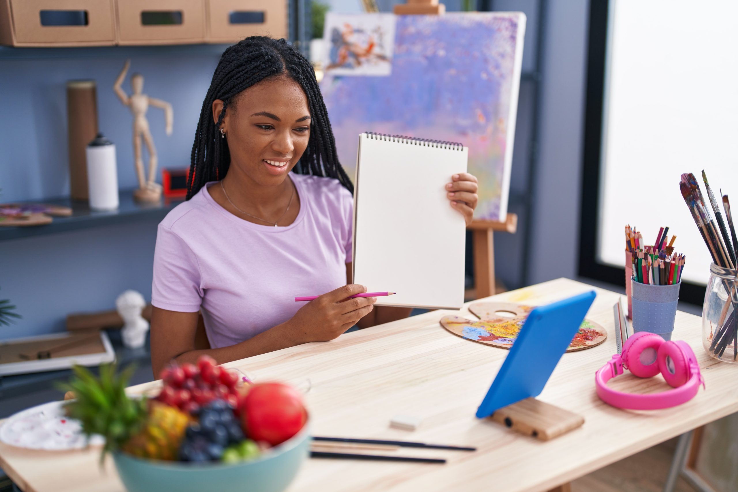 african-american-woman-artist-having-online-draw-class-art-studio (1)